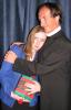 The Padre comforts a simple virgin