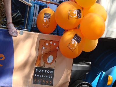 Balloons, A Banner And A Foot